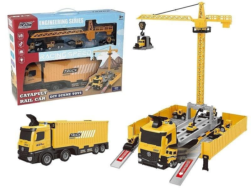 Ciężarówka z rozkładaną naczepą plac budowy z dźwigiem i autkami